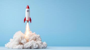 A red and white rocket is taking off from the ground photo