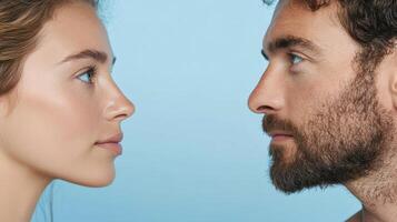A man and woman looking at each other photo