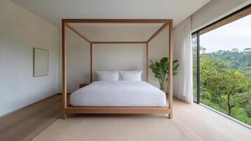 A bedroom with a four poster bed and a view of the mountains photo