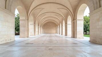 A long hallway with arches and white tile floor photo