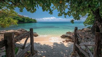 serene beach scene captures essence of vacations with its clear turquoise waters and lush greenery. inviting shore beckons visitors to relax and enjoy beauty of nature photo