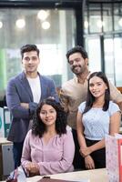 Young Business People On Background Of Modern Office photo