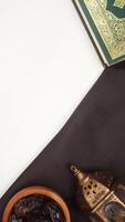Muslim decoration for Ramadan and Eid al-Fitr with black fabric isolated on white background photo