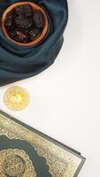 Muslim decoration with dark green fabric for Ramadan and Eid al-Fitr isolated on light background photo