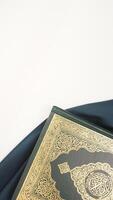 Beautiful muslim decoration with dark green fabric for Ramadan and Eid al-Fitr isolated on light background photo