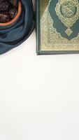Muslim decoration with dark green fabric for Eid al-Fitr and Ramadan isolated on light background photo