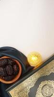 Elegance muslim decoration for Ramadan and Eid al-Fitr with dark green fabric isolated on light background photo