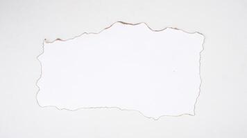 White paper with burnt edges isolated on white background with clipping path photo