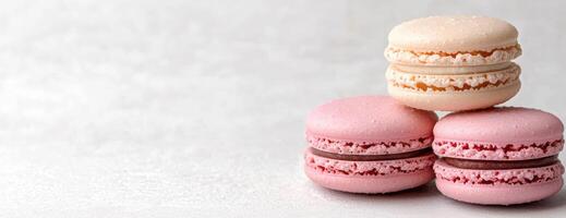 Stack of colorful macarons on a white surface photo