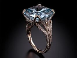 A luxurious ring with a large blue gemstone and intricate gold detailing photo