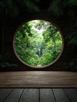 A tranquil waterfall view through a round window in a lush forest photo