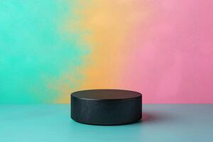 sleek black circular platform rests against vibrant gradient wall of teal and pink, creating striking visual contrast that enhances any display photo