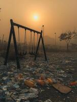Environmental Decline at Deserted Playground Surrounded by Waste photo