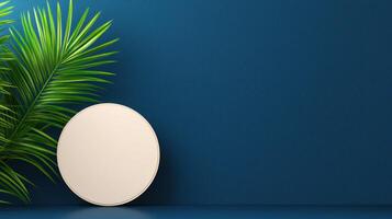 round, blank canvas rests against deep blue wall, accompanied by vibrant green palm leaf, creating serene and modern atmosphere photo