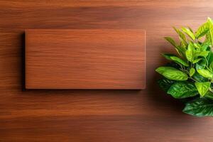 wooden surface with rectangular wooden board and green potted plant creates warm and inviting atmosphere photo