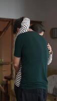 An Intimate and Warm Embrace Between a Loving Couple in a Cozy and Inviting Setting video