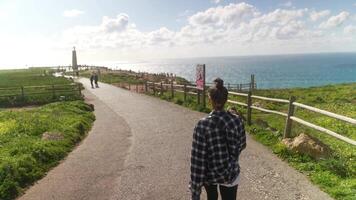 Walking Slowly Along the Beautiful and Scenic Coastal Path on a Bright Sunny Day Outdoors video