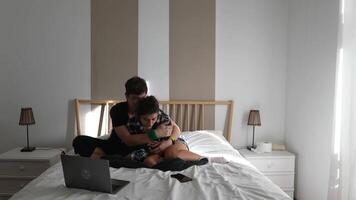 Casual, cozy moments of connection unfold in a charming and intimate bedroom setting video