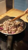 The Art of StirFrying Fresh Onions and Garlic in a Skillet for Your Delicious Meals video