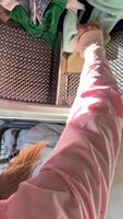 Sorting Laundry A Daily Household Chore Captured in Action and its Importance in Life video
