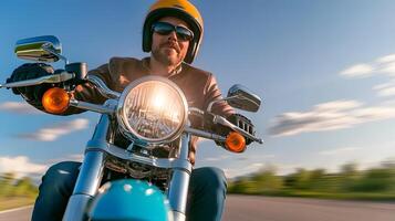 A motorcyclist rides on an open road their helmet clad figure sharply focused as they take on an exhilarating adventure through the expansive landscape photo
