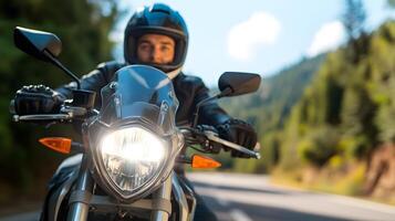 A motorcyclist navigates through the winding roads of a scenic mountain landscape exploring the open adventure with clear focus and determination photo