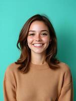 Portrait of a young smiling woman dressed in a casual beige sweater exuding a warm and friendly demeanor as a mental health counselor photo