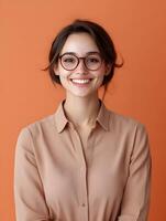 Portrait of a young cheerful public relations specialist in a professional business attire exuding confidence and a warm friendly demeanor photo