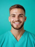 Smiling young orderly in medical uniform photo