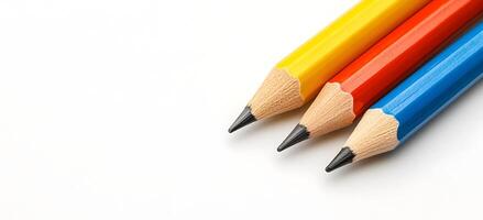 Colorful Pencils Arranged on a White Background for Creative and Purposes photo