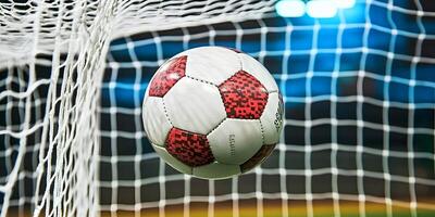 Close up of a Soccer Ball Just Before Hitting the Net photo