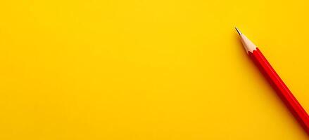 Yellow Background with Pencil for Creativity and Education Concepts photo