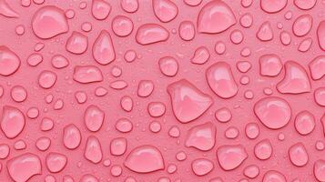 Pink Water Droplets on a Textured Surface Abstract Background Image of Many Round and Oval Shaped Drops photo