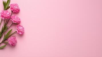 Delicate Pink Flowers on a Soft Pink Background Perfect for Feminine Designs and Spring Themes photo