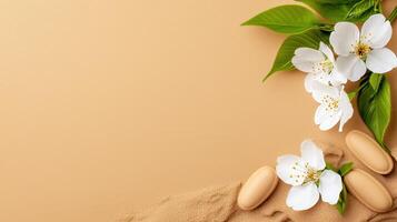 Relaxing Spa Day Beige Soap Bars and Delicate White Cherry Blossoms on Sandy Background photo