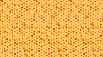 Abstract warmtoned polka dot pattern. Subtle diagonal movement creates visual texture. Ideal for backgrounds, website design, or textile prints. Evokes feelings of warmth, comfort, and autumn. vector