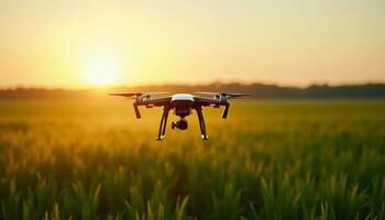 Drone flying over a field at sunset, capturing aerial footage and showcasing modern agricultural technology photo