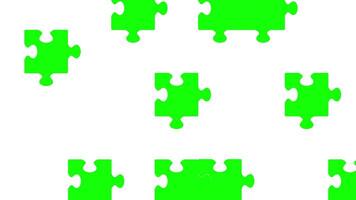 A dissolving wall of green and white puzzle pieces represents transition, challenge, and complexity in this digital environment video