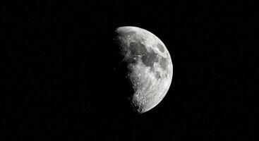 Gibbous moon in a starry sky for night themed designs and astronomy concepts, showcasing the beauty of celestial objects and nighttime. photo