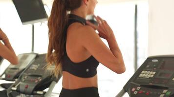 A woman is doing intense exercise on a treadmill. video
