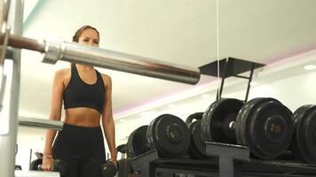 Lateral dumbbell raises in front of mirror for shoulder strength and toning video