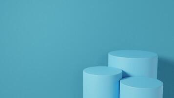 blue background with three white cylinders for display photo