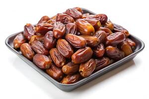 A delicious and natural view of dates arranged in a ceramic tray, a nutritious and healthy snack with a clean white background, perfect for food photography photo