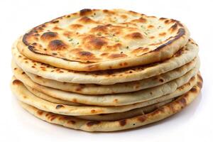 Pile of golden brown naan flatbreads with a crispy texture and sprinkled herbs, shot on a clean white background photo