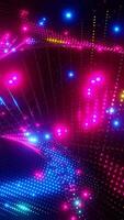 A colorful, neon-lit display of lights and shapes creates a visually striking scene. Vertical looped animation video