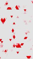 A pattern of red and clear triangles on a white background. Vertical looped animation video