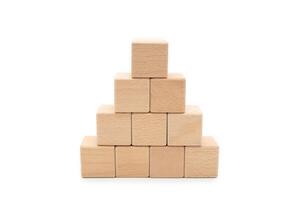 Blank wood cube or wooden blocks arrange in pyramid shape ,business concept. Isolated on white background with Clipping path. photo
