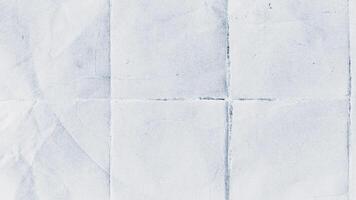 Gritty vintage paper texture background. Stop motion animation of old paper with folded creases and film damage. Abstract grunge paper texture. Full HD and looping. video