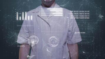 A man in a white coat stands in front of the screen and gestures. video