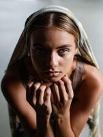 Expression of contemplation captured in a moment of quiet reflection in an urban setting photo